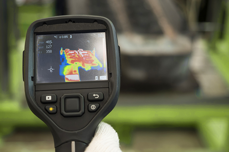 thermal imaging camera being used while preforming home inspection services